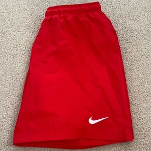 Loose Nike athletic shorts with adjustable strings